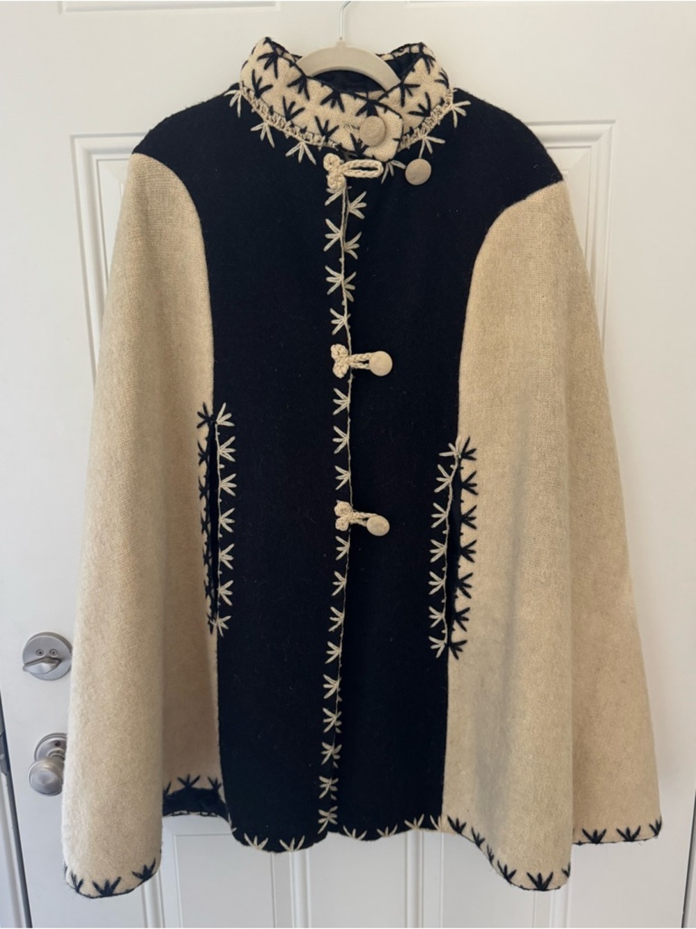 VINTAGE 1960s black and cream hand woven wool cape with mock neck & button front